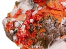 Realgar__pinacoids_and_prisms_with_Calcite
